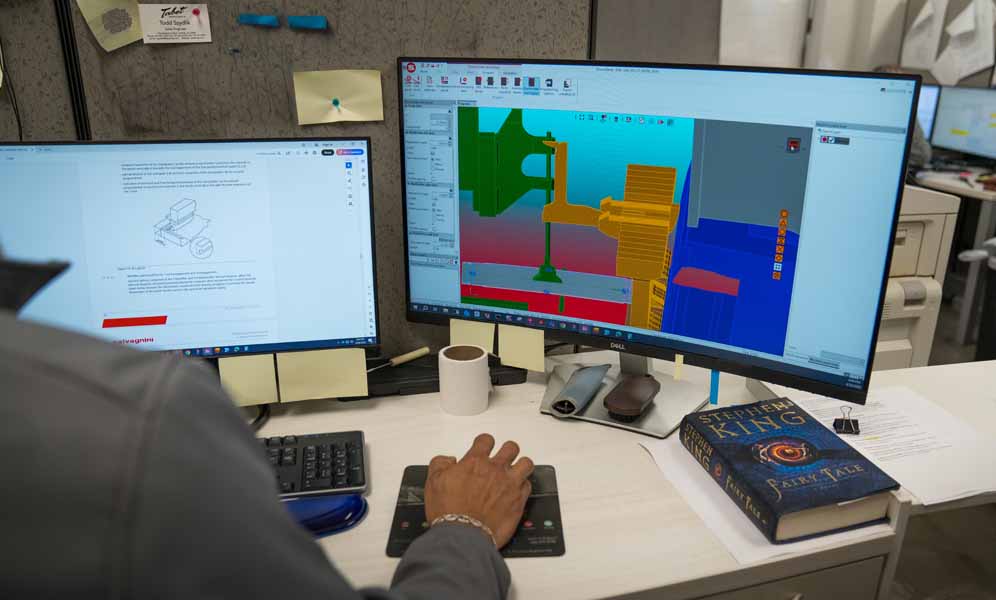 Tabet engineering and design support team using CAD/CAM software
